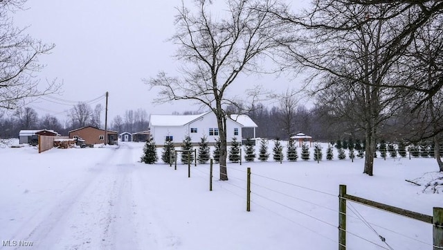 view of yard covered in snow