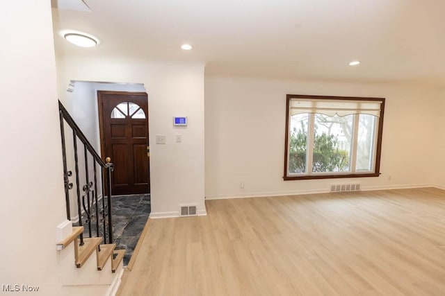 foyer with light hardwood / wood-style flooring