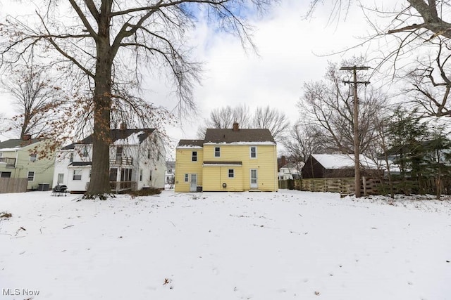 view of snow covered property