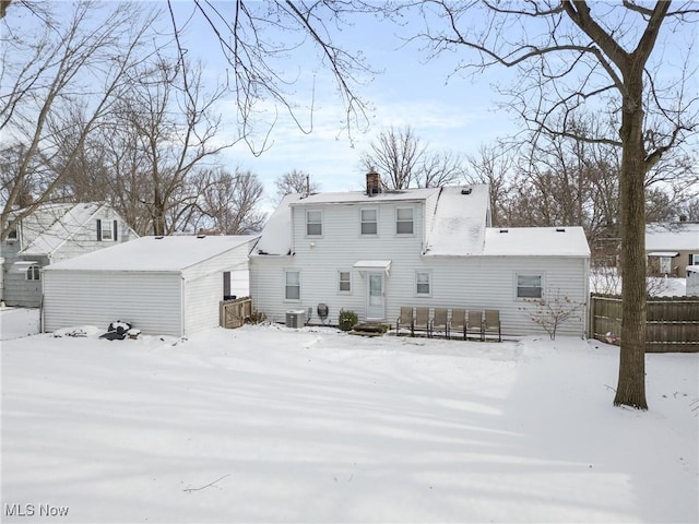 view of snow covered house