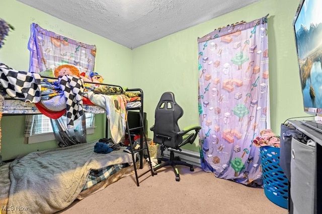 bedroom featuring carpet and a textured ceiling