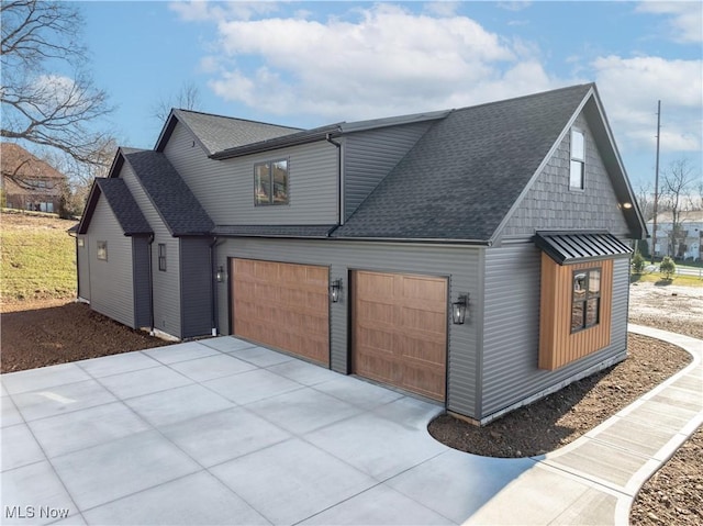 view of property exterior with a garage