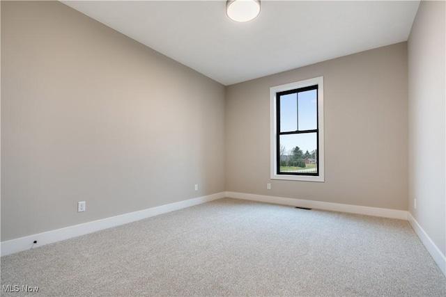 view of carpeted spare room