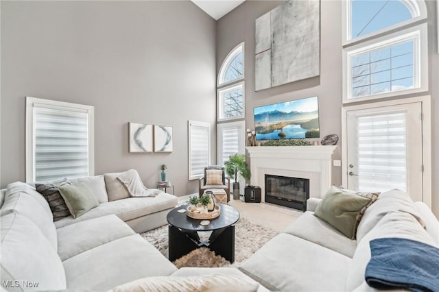 living room with a high ceiling