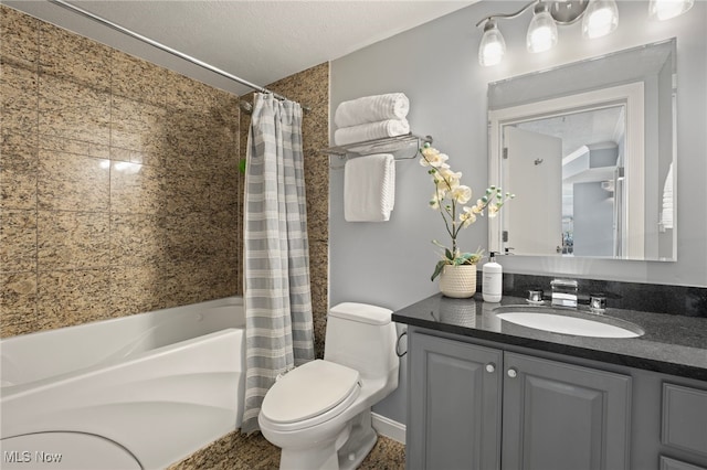 full bathroom featuring vanity, shower / bath combination with curtain, a textured ceiling, and toilet