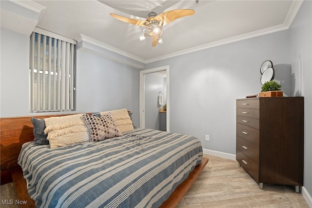 bedroom featuring ceiling fan, ornamental molding, and light hardwood / wood-style flooring