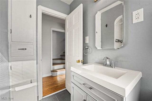 bathroom with vanity and tile patterned floors