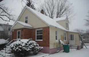 view of snow covered property