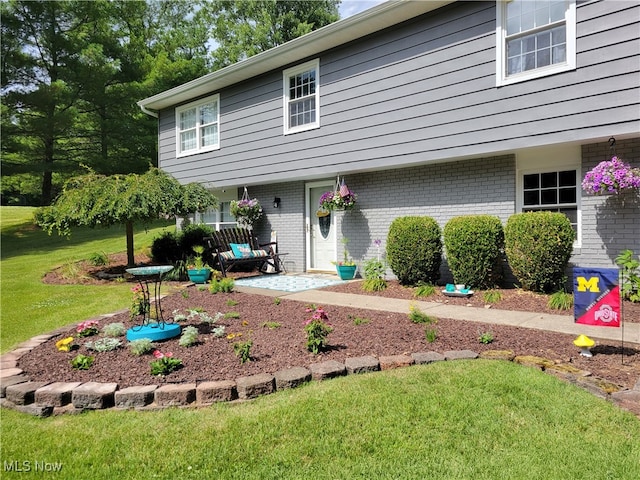 exterior space with a front yard