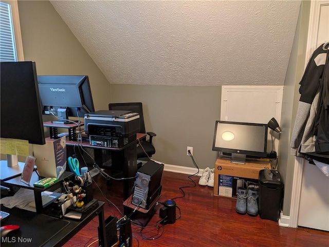 office with lofted ceiling, hardwood / wood-style floors, and a textured ceiling