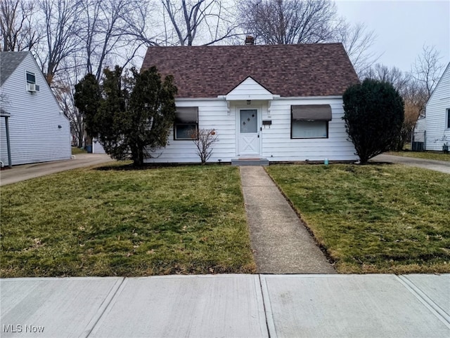 bungalow with a front lawn