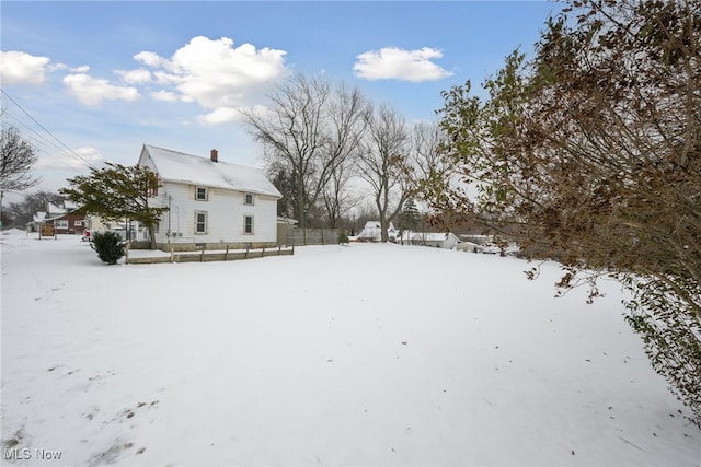 view of yard covered in snow