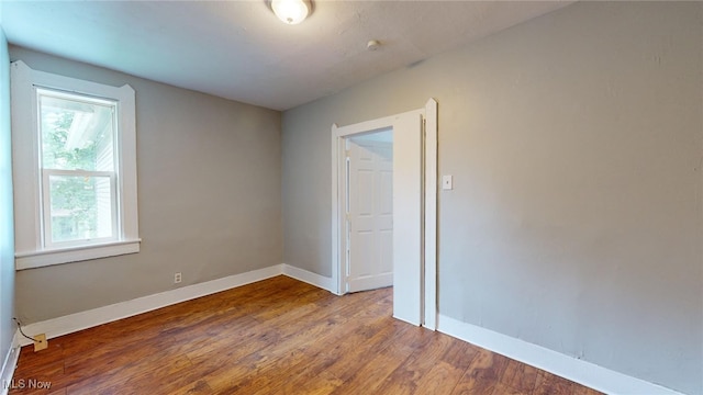 empty room featuring hardwood / wood-style floors