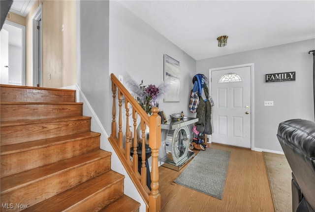 entryway with light hardwood / wood-style floors