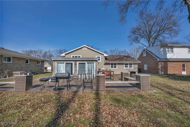 back of house with a yard, a patio, and central AC unit