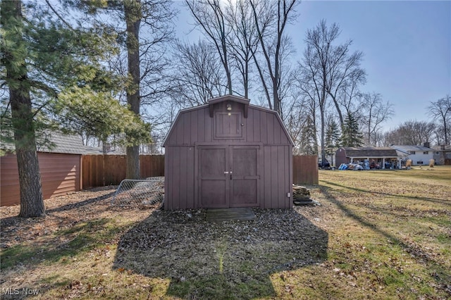 view of outdoor structure with a lawn