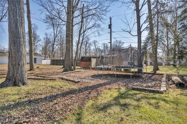 view of yard with a trampoline