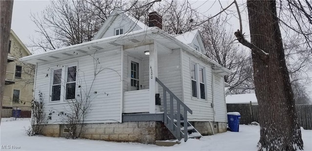 view of snow covered property