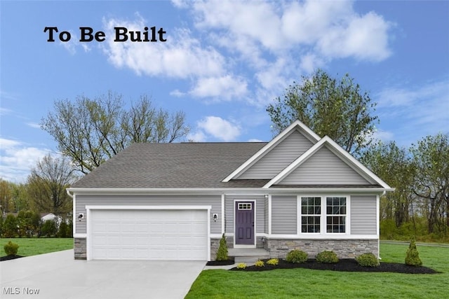 craftsman-style home with a garage and a front lawn