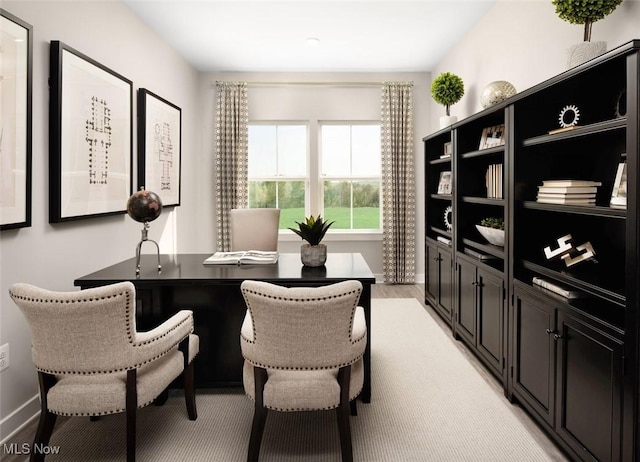 home office featuring light hardwood / wood-style floors