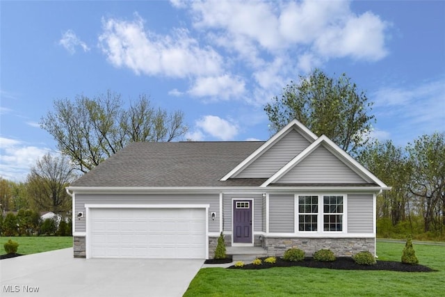 craftsman-style house with a garage and a front yard