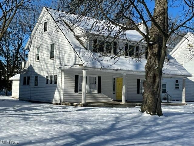 view of front of property featuring covered porch