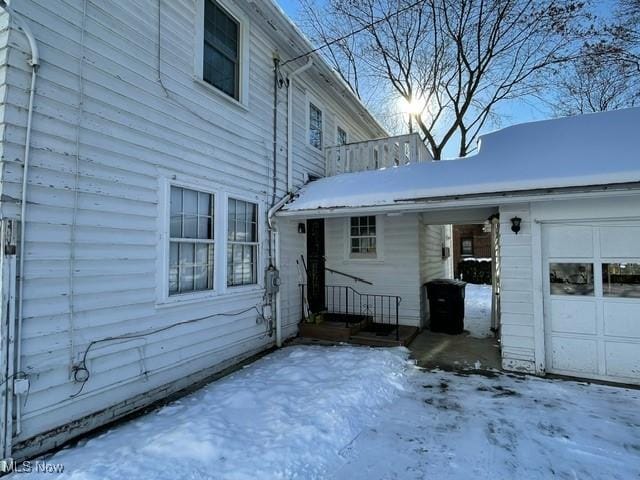 view of snow covered property