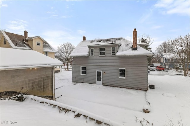 view of snow covered property