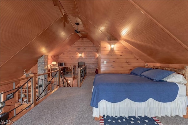 bedroom featuring carpet, wood walls, and wood ceiling