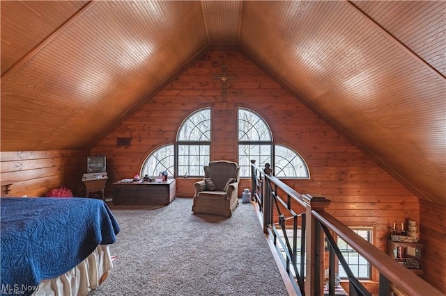 bedroom with carpet, lofted ceiling, wood walls, and wooden ceiling