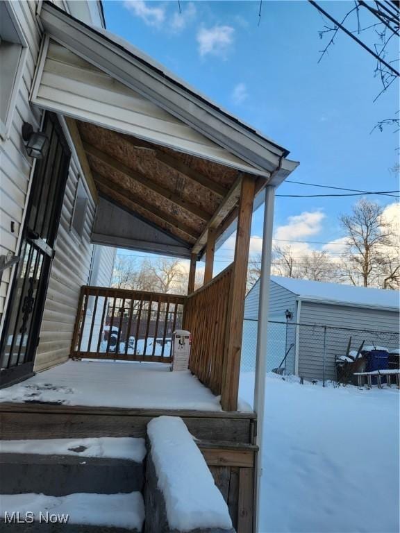 view of snow covered deck