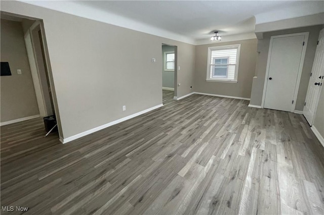 empty room featuring wood-type flooring