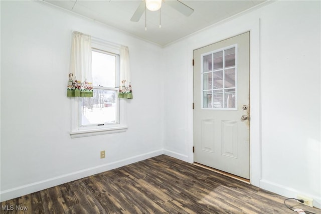 entryway with ceiling fan, dark hardwood / wood-style flooring, and ornamental molding