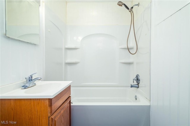 bathroom featuring shower / washtub combination and vanity