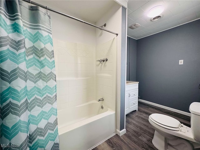 full bathroom with shower / bath combination with curtain, vanity, wood-type flooring, and toilet