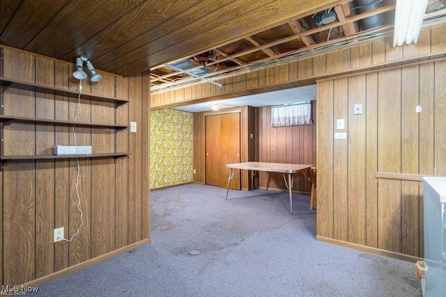 basement with wooden walls, carpet floors, and wood ceiling