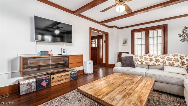 living room featuring dark hardwood / wood-style flooring, beamed ceiling, and french doors