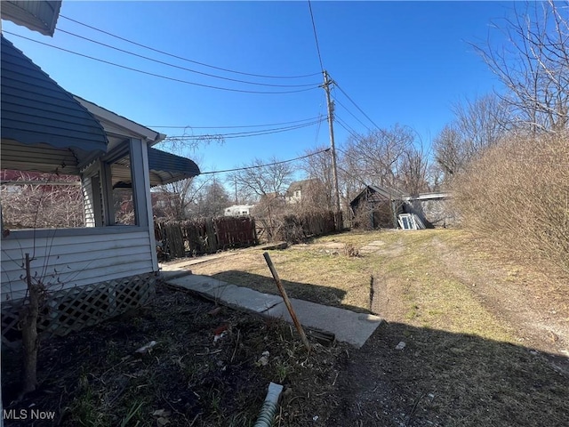 view of yard with fence