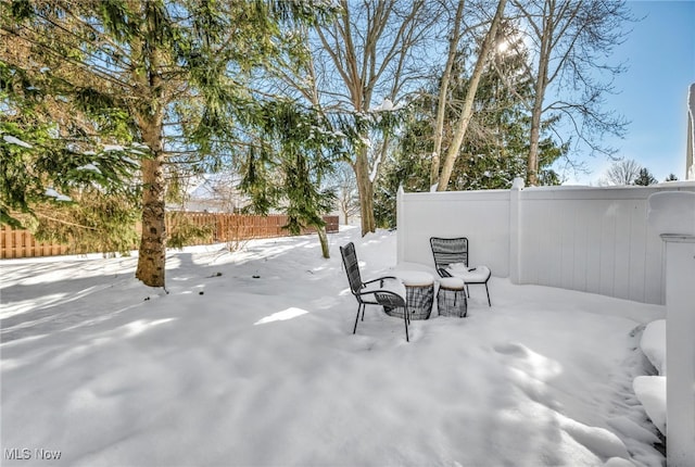 view of snow covered patio