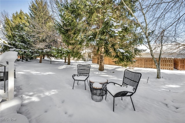 view of snow covered patio