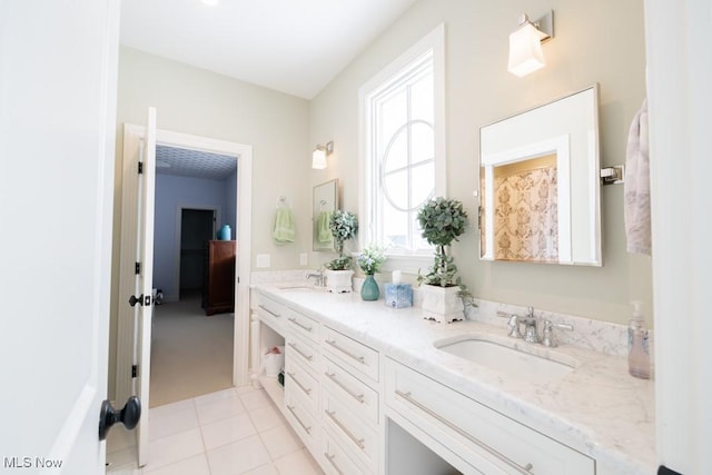 bathroom with vanity, tile patterned floors, and plenty of natural light