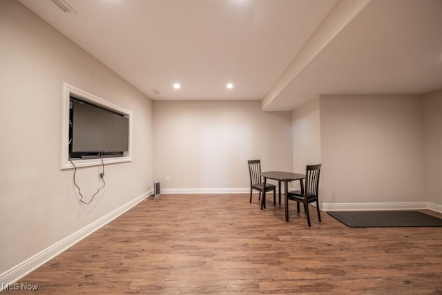 sitting room featuring hardwood / wood-style flooring