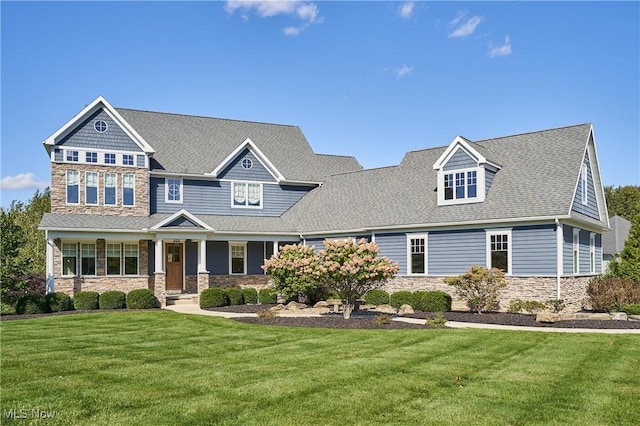 view of front of home with a front lawn