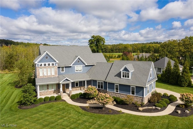 view of front of home with a front yard