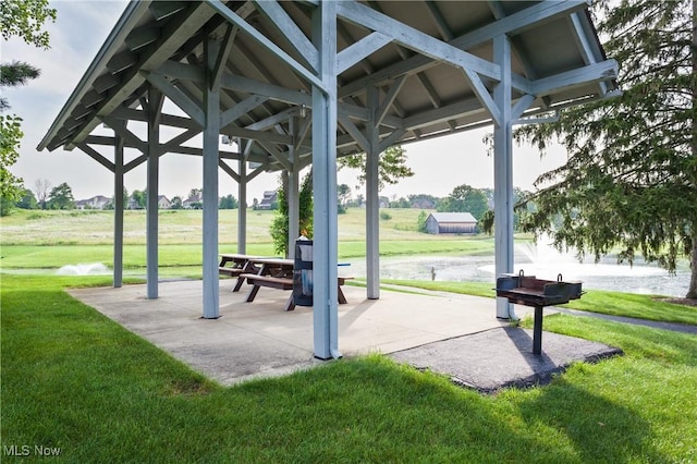 view of home's community with a yard