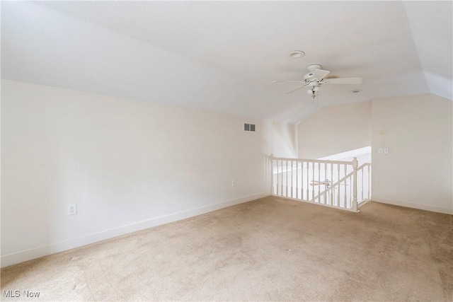 bonus room featuring carpet floors, vaulted ceiling, and ceiling fan