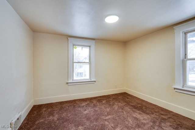 view of carpeted spare room