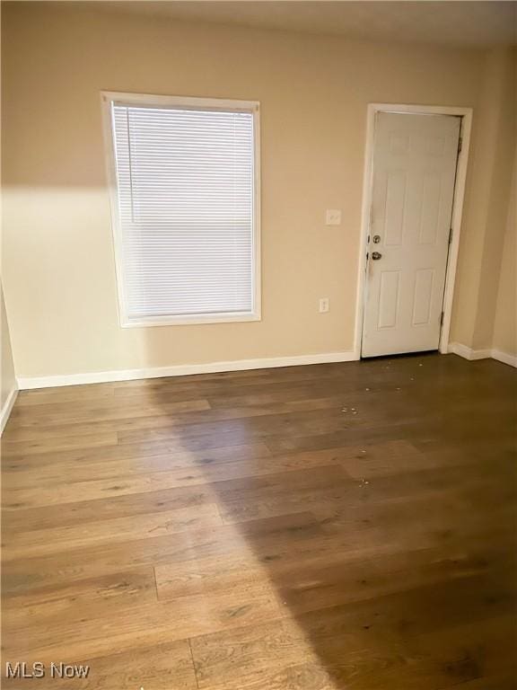 empty room featuring hardwood / wood-style floors