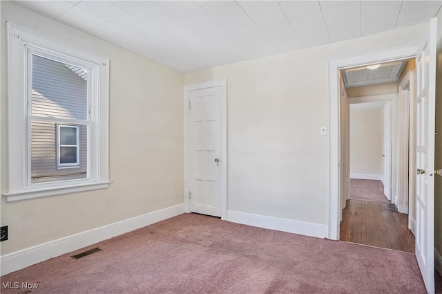 empty room with carpet floors