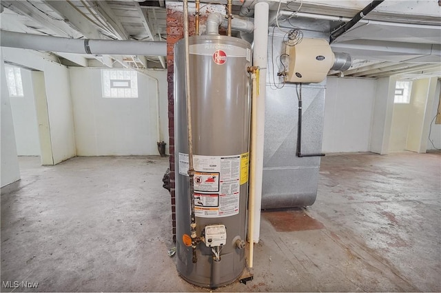 utility room with water heater